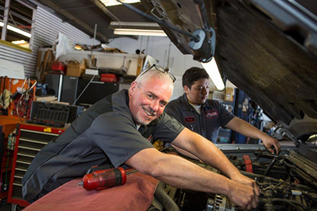 Ted Curran working on the car | Monkey Wrenches Inc